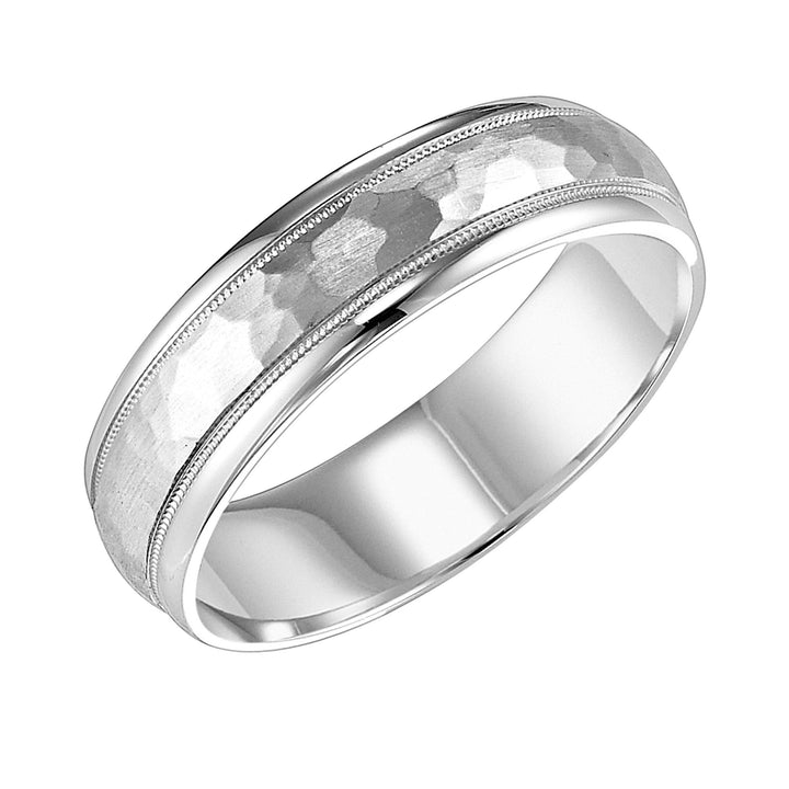 11-6867W6-G.00 - Goldman - This low domed Comfort Fit wed band features a brushd hammerd finish with milgrn and round edges to complete this luxurious yet classic look Pls note hand hammerd styles will have slight variations due to the nature of the 