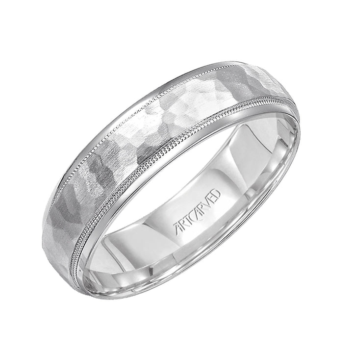 Comfort Fit wedding band with hammered satin finish and rolled edges Please note hand hammered styles will have slight variations due to the nature of the manufacturing process