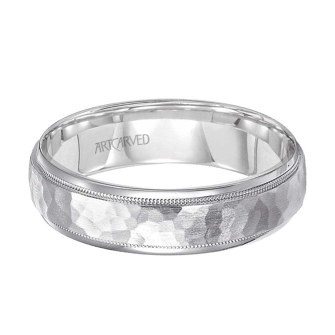 Comfort Fit wedding band with hammered satin finish and rolled edges Please note hand hammered styles will have slight variations due to the nature of the manufacturing process