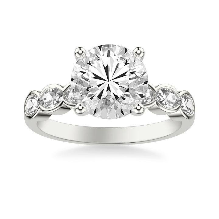 Contemporary Engagement Ring with East-West Bezel Set Oval Diamond Scalloped Shank