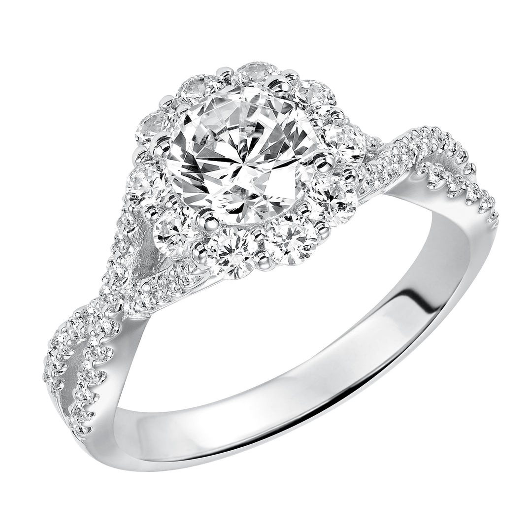 Awe-inspiring sparkle illuminates from this engagement ring featuring a shared prong set diamond halo and elegant twisted diamond band for grand effect..  Center Stone is not included.
