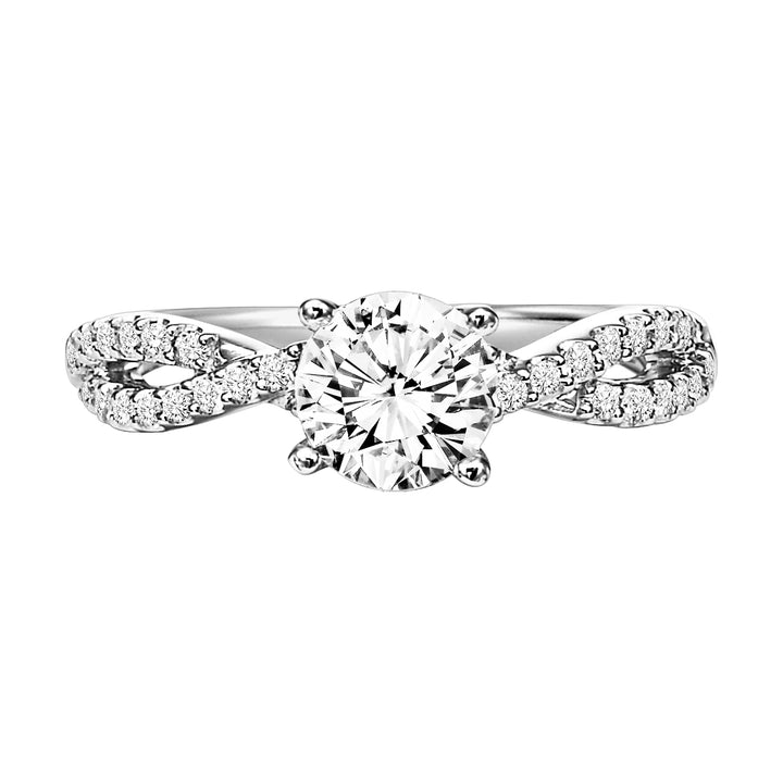 This engagement ring features a diamond prong set band with a delicate twist design elegantly leading up to the round center diamond for an alluring look.  Center Stone is not included.