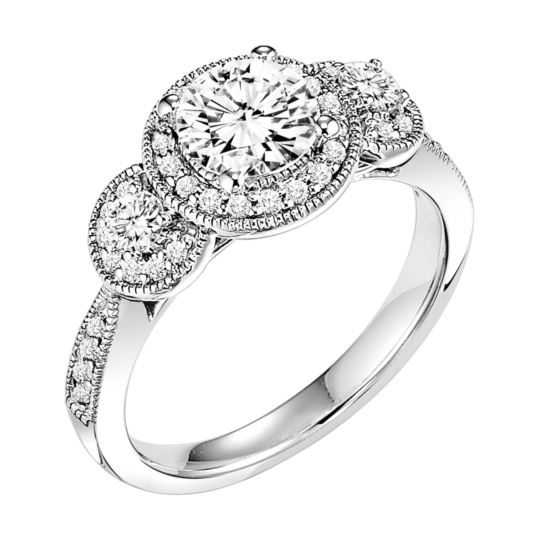 Fusing glamour and vintage flair, this 3-stone round diamond engagement ring features a prong set diamond halo and band with milgrain detailing .  Center Stone is not included.