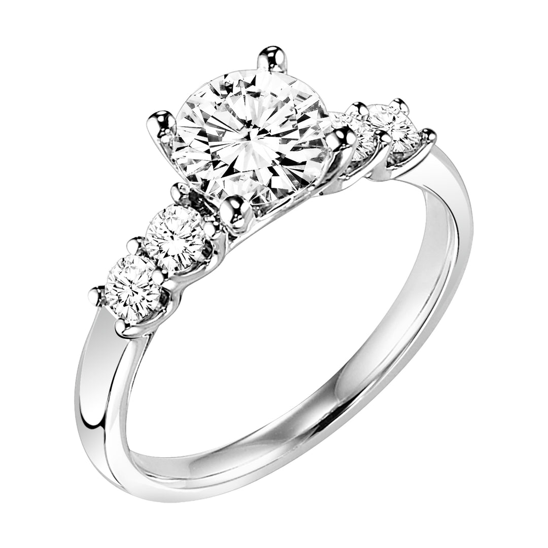 Featuring a brilliant round diamond center stone with a two prong set round diamonds on each side with a high polished band, this engagement ring is simply stunning.  Center Stone is not included.
