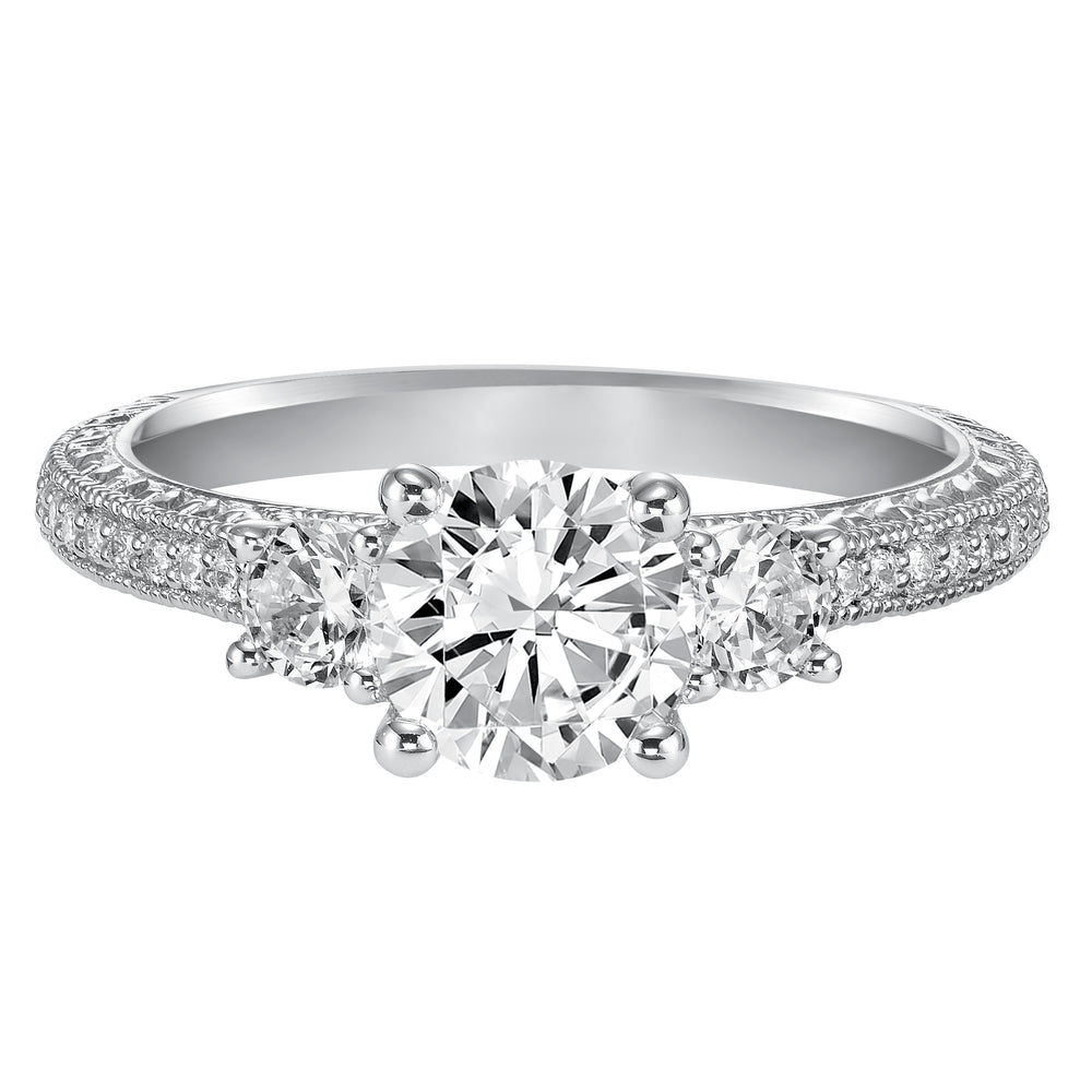 This eye-catching 3-stone engagement sparkles with its diamond prong set band with engraving and milgrain details.  Center Stone is not included.