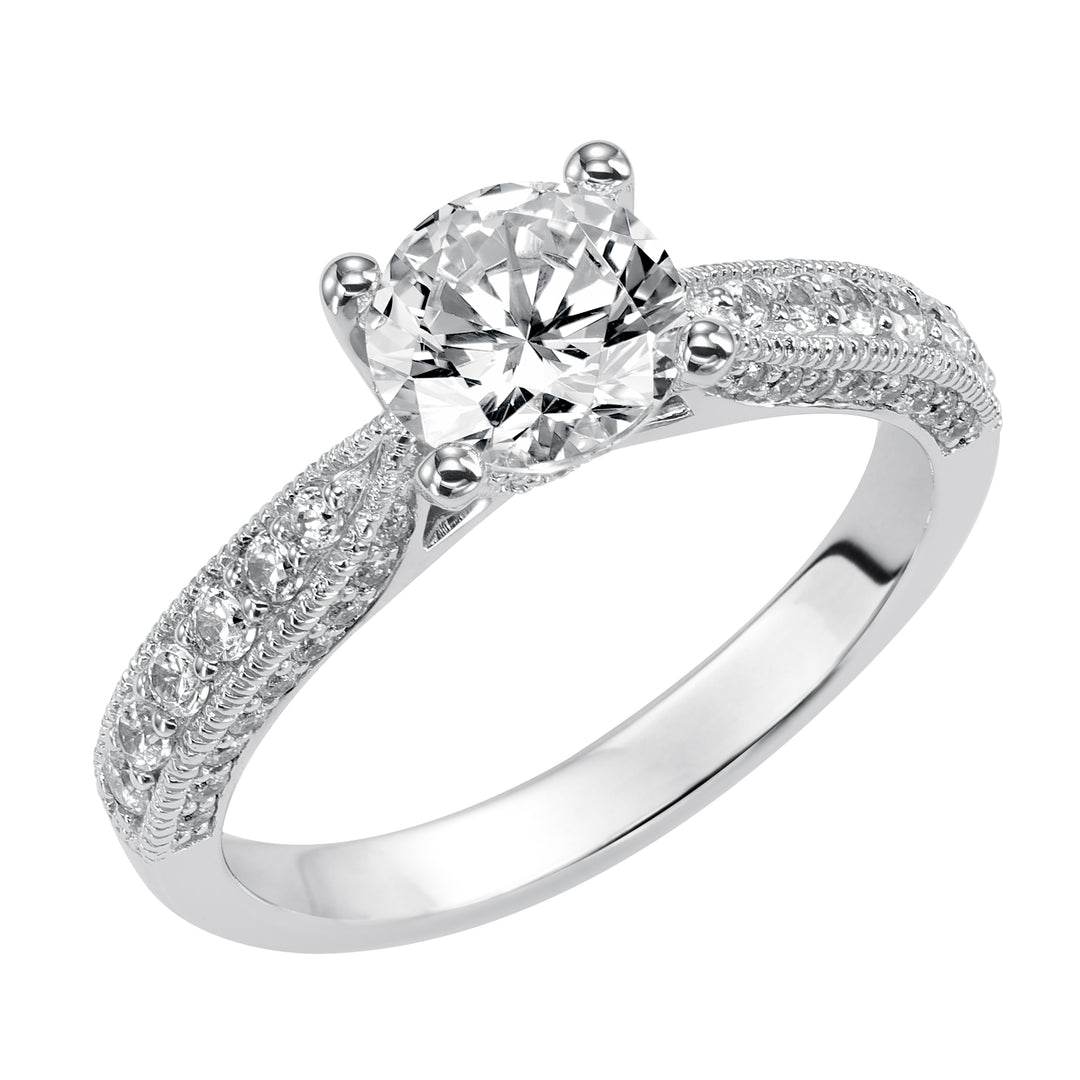 Milgrain detailing accents the diamond prong set band of this magnificent engagement ring