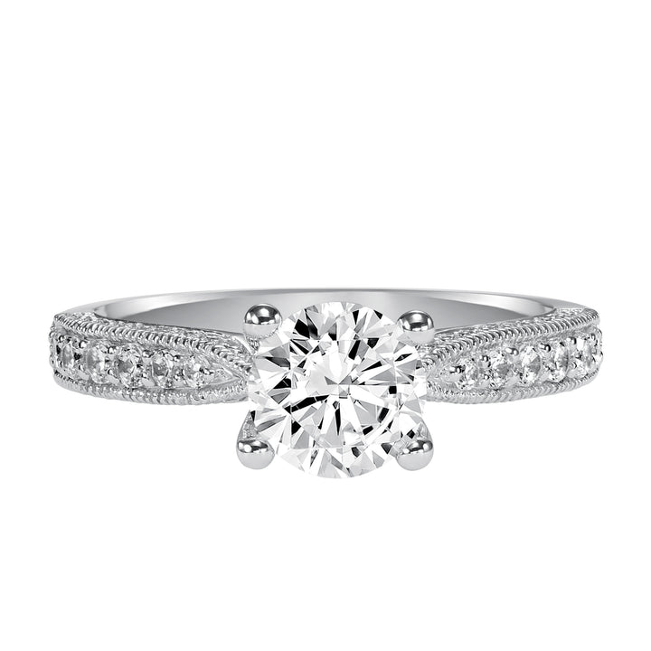 Milgrain detailing accents the diamond prong set band of this magnificent engagement ring