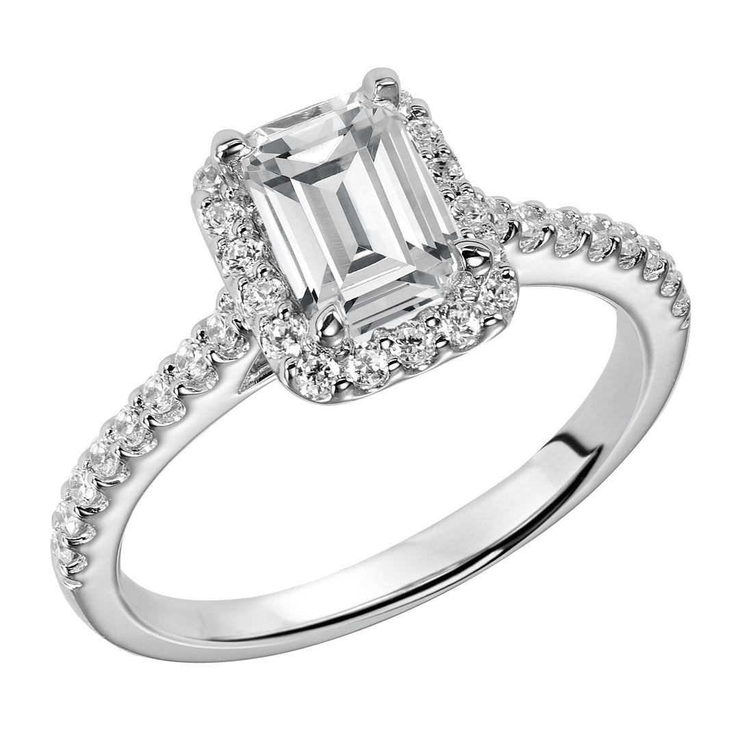 This timeless engagement ring features a diamond exquisitely enhanced with a prong set diamond halo and band.  Center Stone is not included.