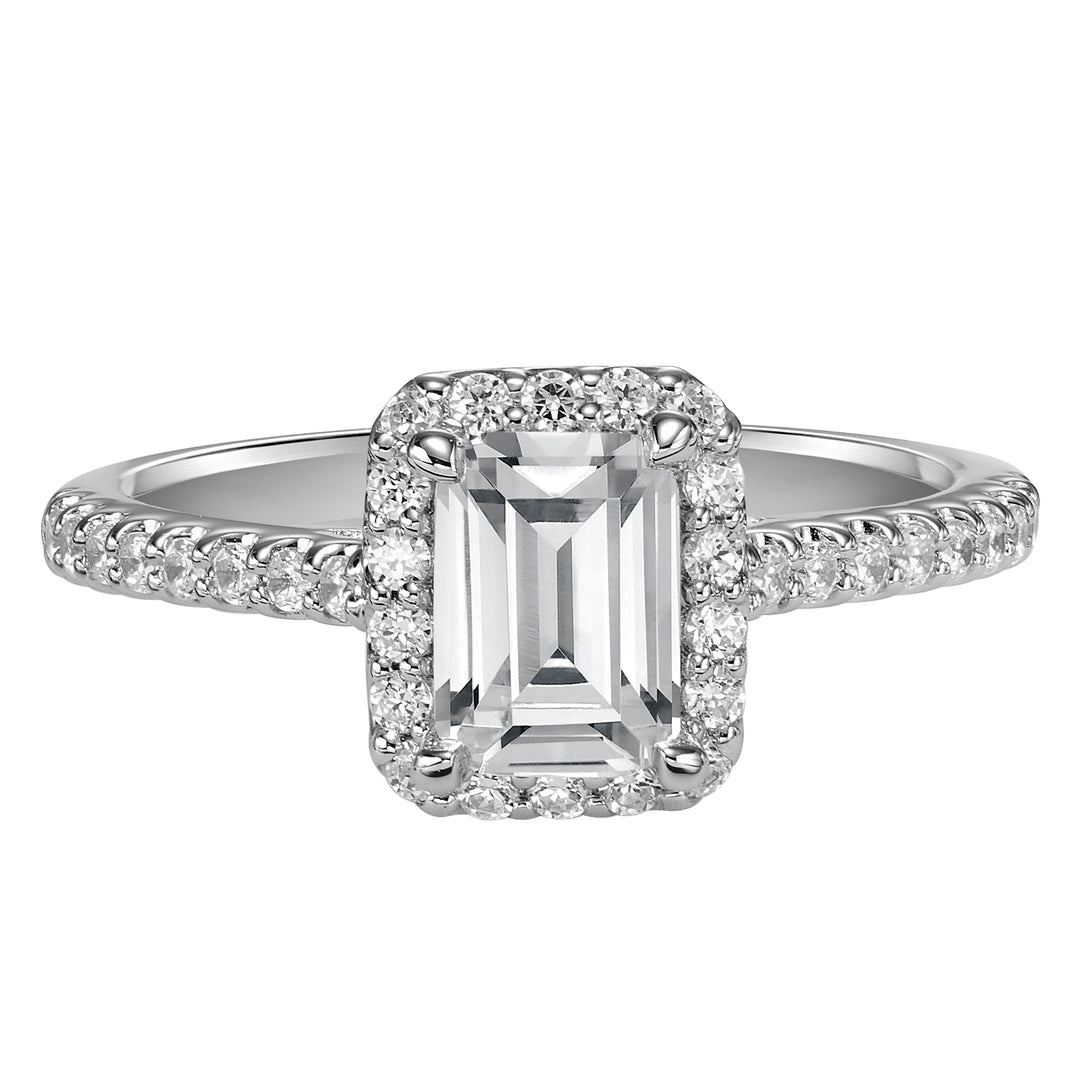 This timeless engagement ring features a diamond exquisitely enhanced with a prong set diamond halo and band.  Center Stone is not included.