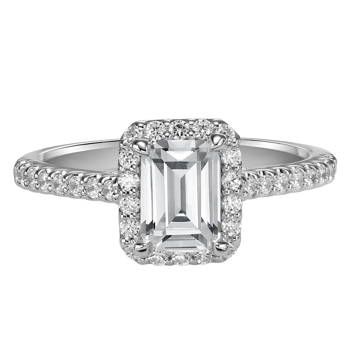 This timeless engagement ring features a diamond exquisitely enhanced with a prong set diamond halo and band.  Center Stone is not included.
