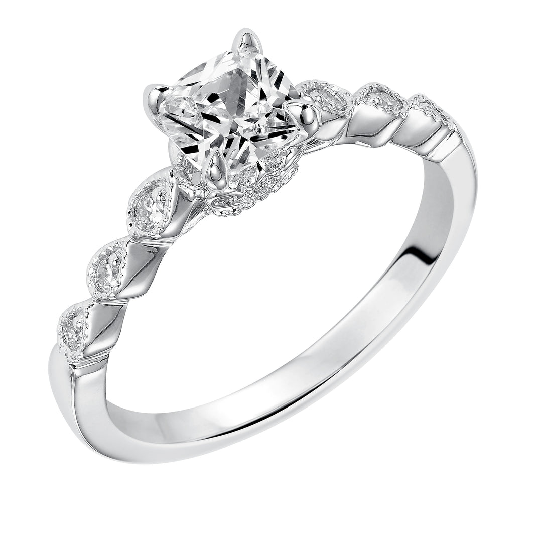 Dazzling with its intricately designed diamond band, this engagement ring is distinct yet enchanting