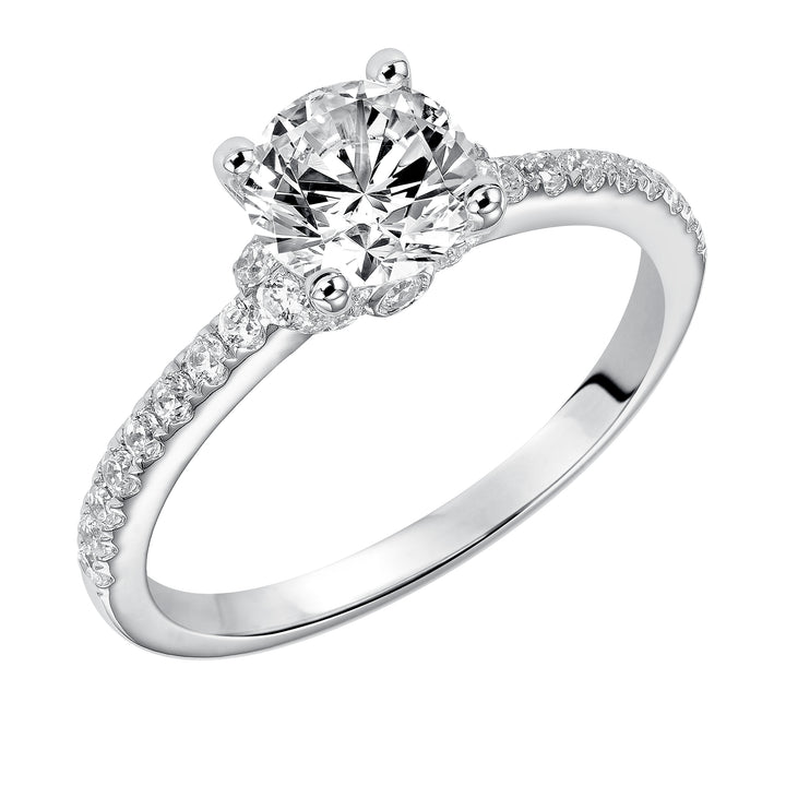 This engagement ring celebrates classic elegance with its delicate diamond prong set band and diamond tiara accent.  Center Stone is not included.