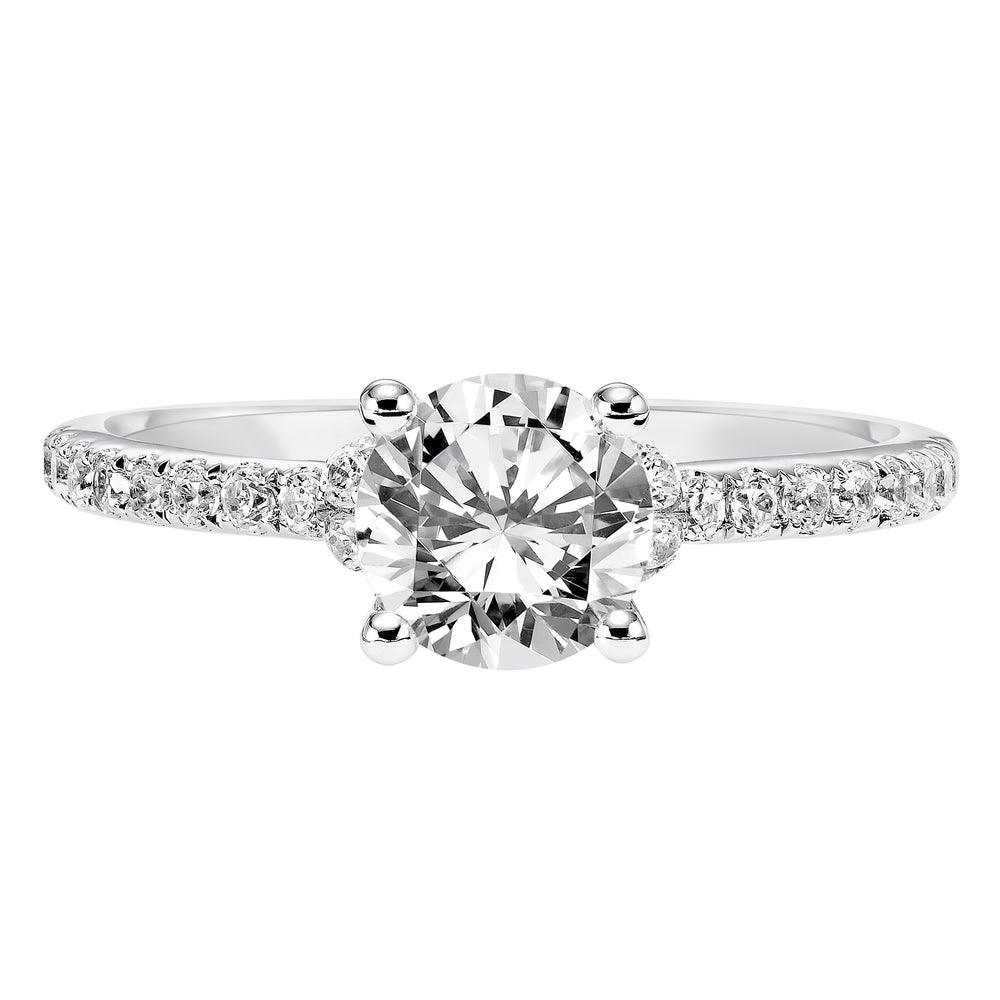 This engagement ring celebrates classic elegance with its delicate diamond prong set band and diamond tiara accent.  Center Stone is not included.