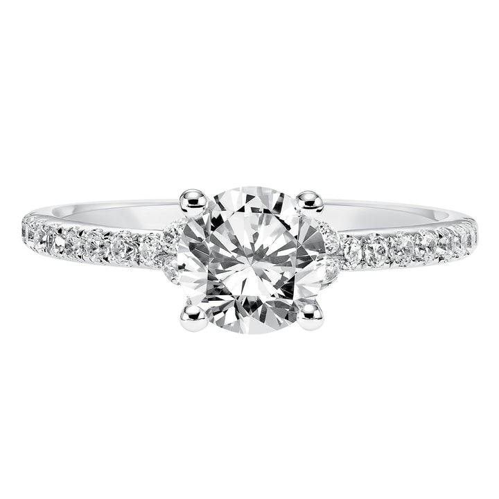 This engagement ring celebrates classic elegance with its delicate diamond prong set band and diamond tiara accent.  Center Stone is not included.
