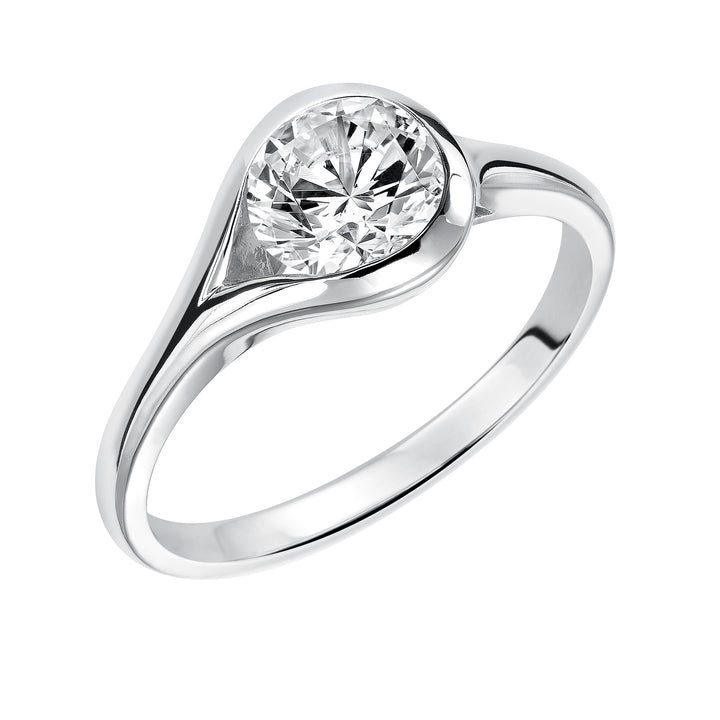 Chic and modern, this engagement ring is set beautifully in a high polished bezel set and bypass designed band