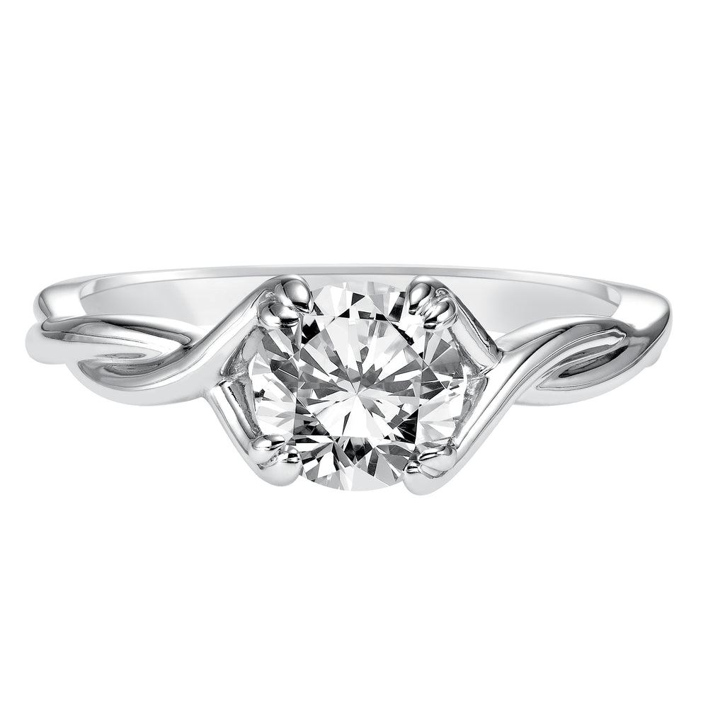 This ribbon-twist inspired high polished band gracefully accentuates the center diamond