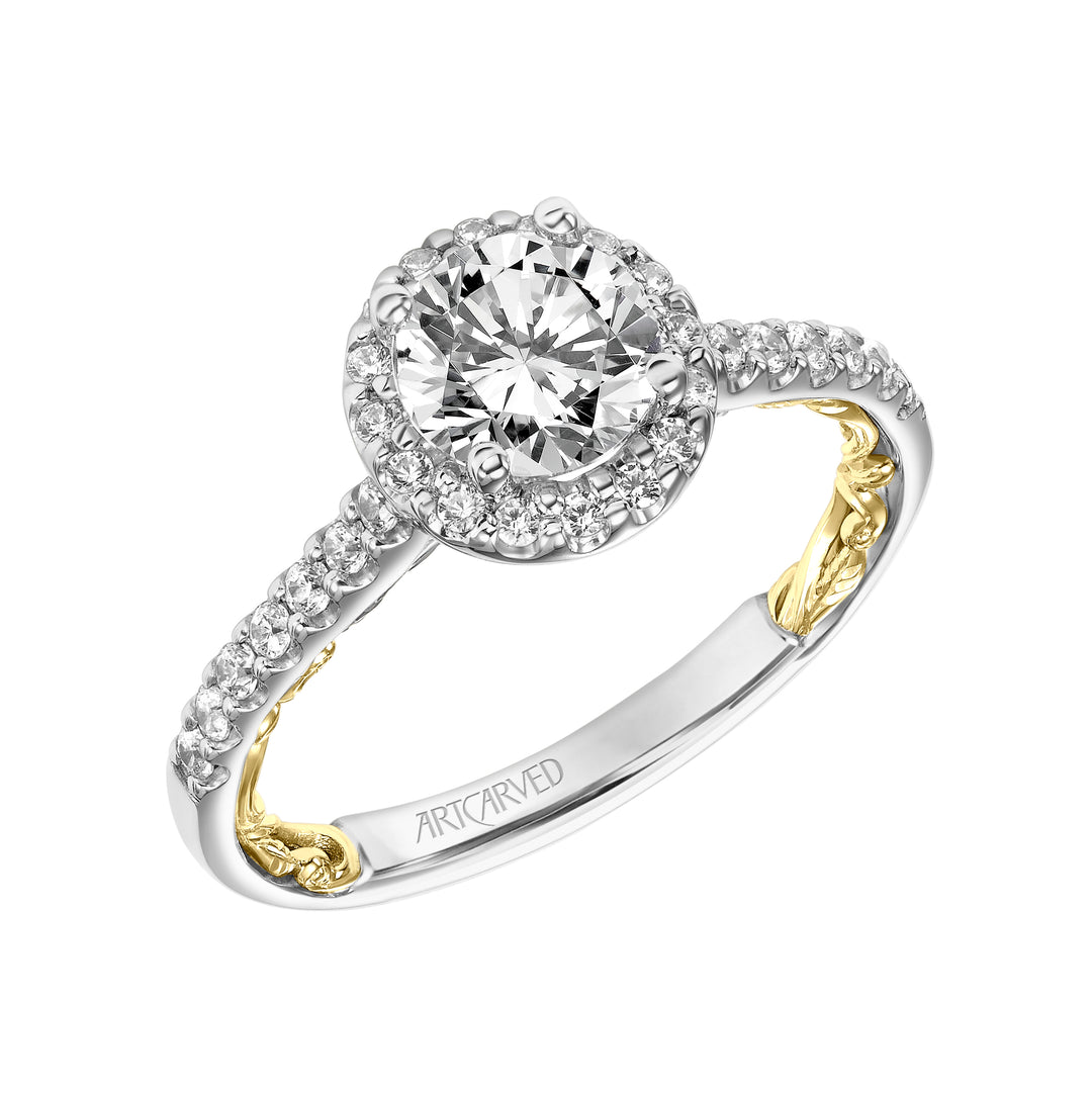 Lyric Engagement Ring with Round Diamond Halo and Accented Diamond Gallery with Inner Carved details and Diamond Shank.  Center Stone is not included.