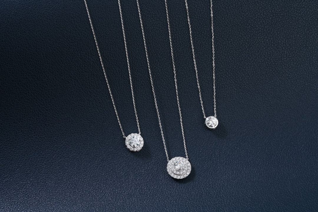 three diamond necklaces