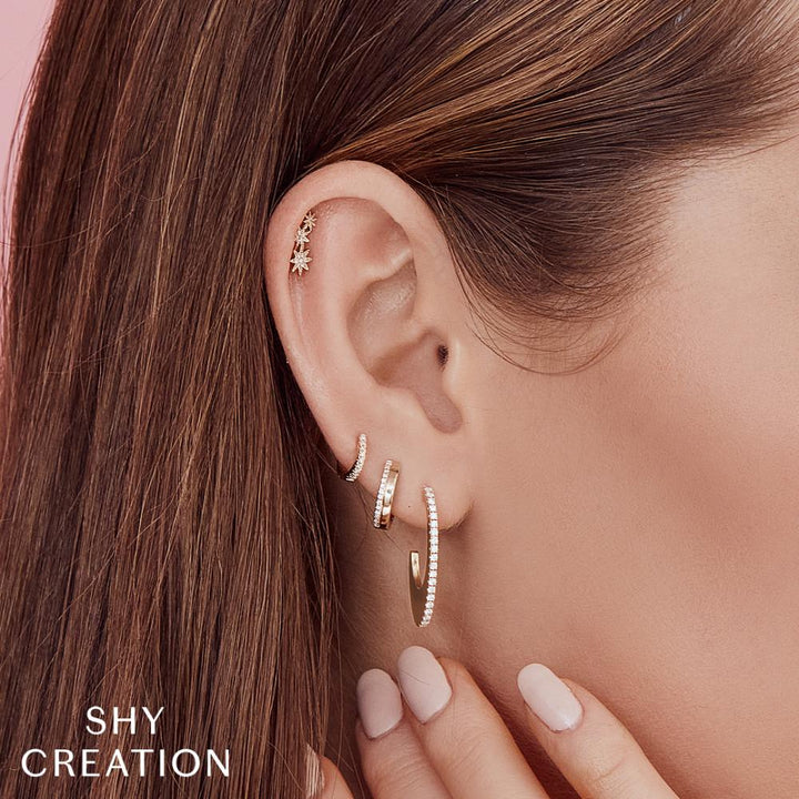 SC55006225 14K Yellow Gold Huggie Earrings from the Kate Collection